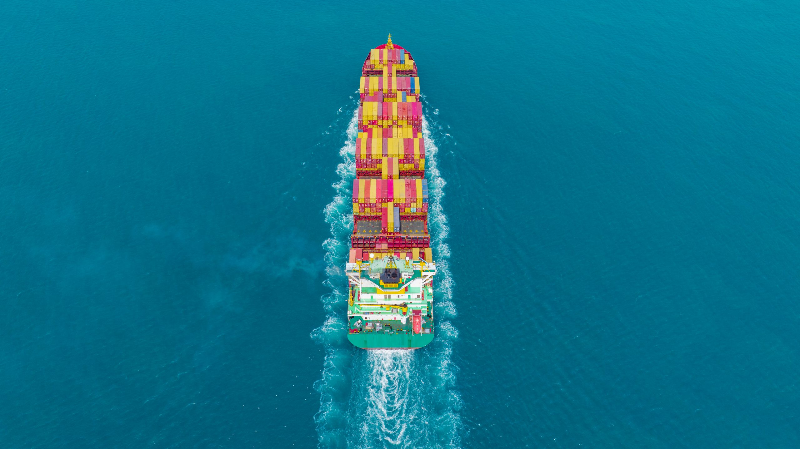 Cargo container Ship, cargo maritime ship with contrail in the o